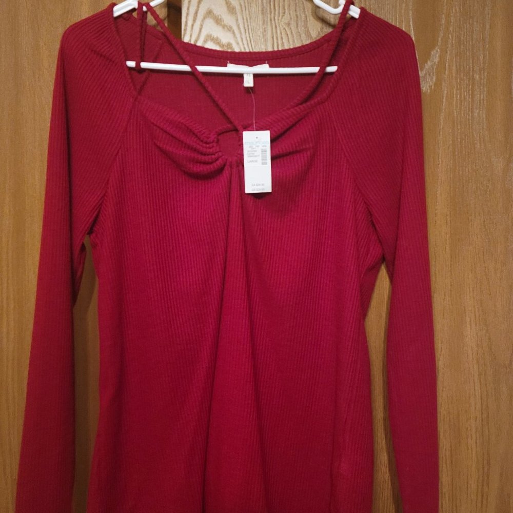 Maurices Maroon in color cotton soft top with hole in middle top